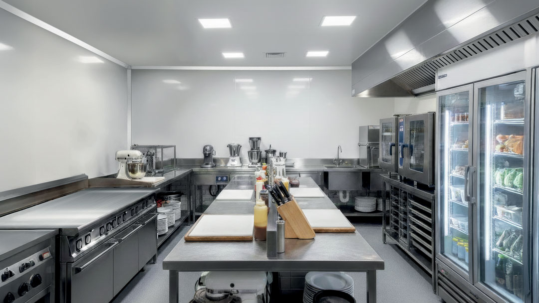 How-to-Pass-Florida-DBPR-Plan-Review--The-Ultimate-Guide-to-Sanitary-Coving, Food facility coving requirements, Water pooling in commercial kitchens, Easily cleanable baseboards, Peeling rubber baseboards, Water flush cleaning methods