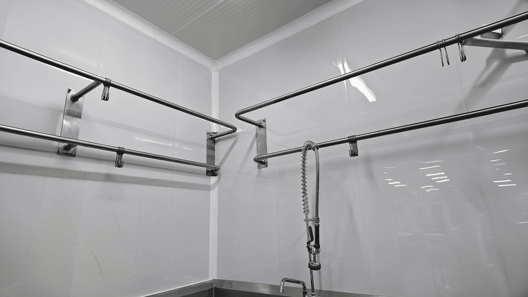 Specialized flooring subcontractors, Commercial kitchen baseboard installation, FRP wall panel trim, Snap-on cove base system, Rigid PVC sanitary cove base