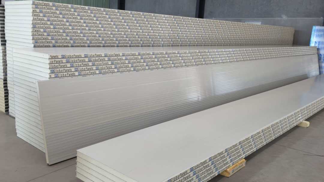 Showing how symmetrical insulated panels with reversible faces allow contractors to flip off-cuts and eliminate material waste during installation, contractor friendly IMPs, walk-in cooler panels