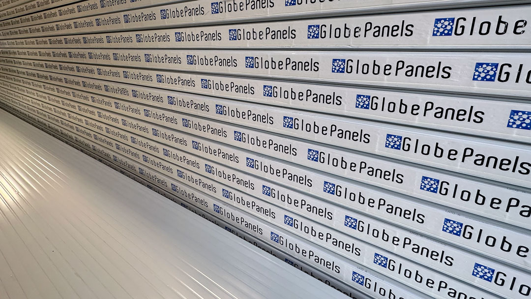 Chart comparing IMP price per sq ft with total installed cost, highlighting the labor savings of GlobeWall panels by Globe Panels.